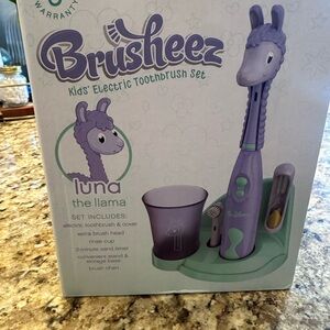 Brusheez Kids' Electric Toothbrush Set - Purple and Green